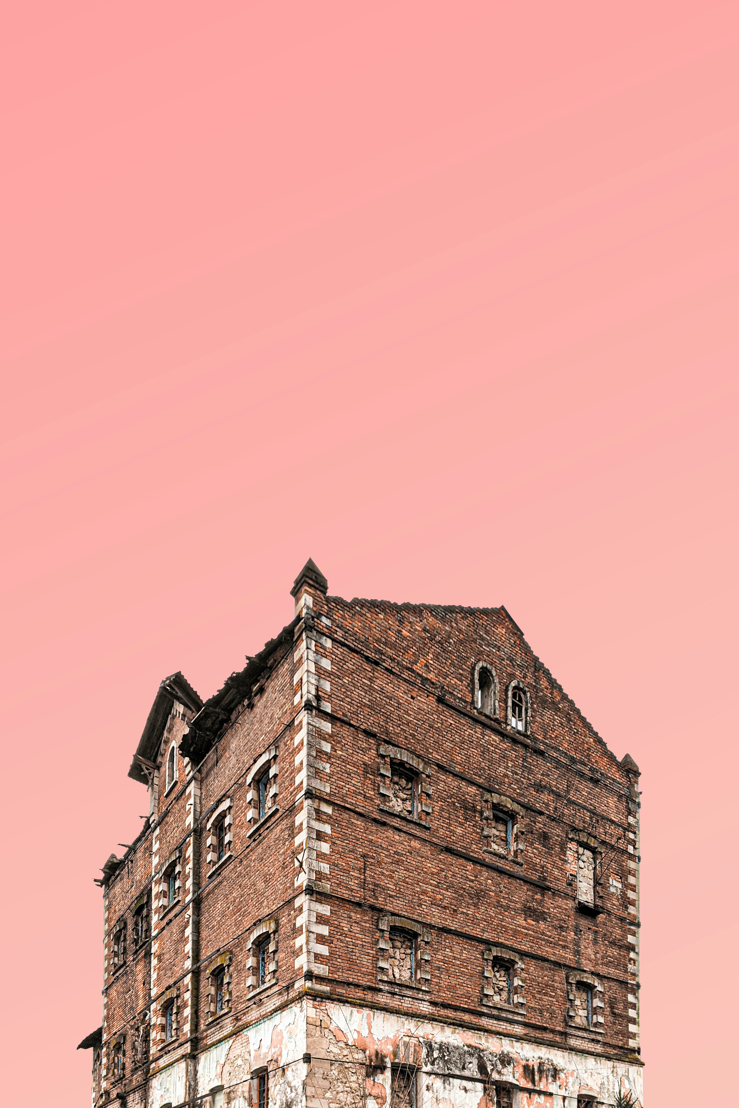 brown concrete building under blue sky during daytime